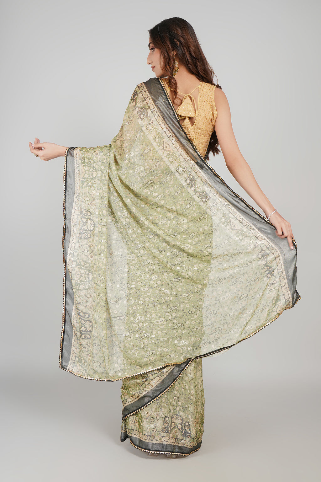 Light Olive Green Brasso Printed Saree with Metallic Grey Border